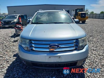 Piąte zdjęcie samochodu w środku: 2008 FORD TAURUS X SEL VIN:1FMDK05WX8GA38553 - miniatura
