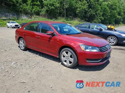 Czwarte zdjęcie samochodu z boku: 2015 VOLKSWAGEN PASSAT S VIN:1VWAT7A39FC004145 - miniatura