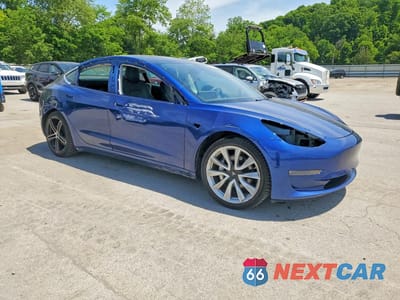 Czwarte zdjęcie samochodu z boku: 2020 TESLA MODEL 3 VIN:5YJ3E1EB6LF620503 - miniatura