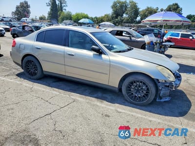 Czwarte zdjęcie samochodu z boku: 2004 INFINITI G35 BASE VIN:JNKCV51E84M605354 - miniatura