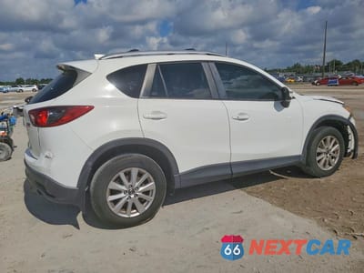 Trzecie zdjęcie samochodu z tyłu: 2015 MAZDA CX-5 TOURING VIN:JM3KE2CY6F0501062 - miniatura