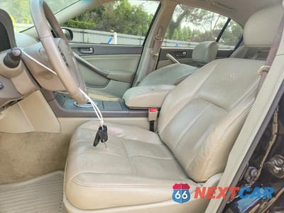 Zdjęcie 7 z 12 samochodu: 2003 INFINITI G35 BASE VIN:JNKCV51E23M324438 - miniatura