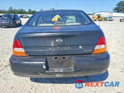 Zdjęcie 6 z 12 samochodu: 1998 NISSAN ALTIMA XE VIN:1N4DL01D2WC142440 - miniatura