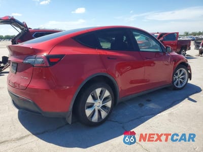 Trzecie zdjęcie samochodu z tyłu: 2023 TESLA MODEL Y VIN:7SAYGDEE9PA203149 - miniatura