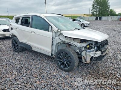 Czwarte zdjęcie samochodu z boku: 2017 FORD ESCAPE SE VIN:1FMCU9GD8HUC91877 - miniatura