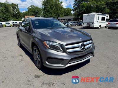 Czwarte zdjęcie samochodu z boku: 2015 MERCEDES-BENZ GLA 250 4MATIC VIN:WDCTG4GB4FJ079824 - miniatura