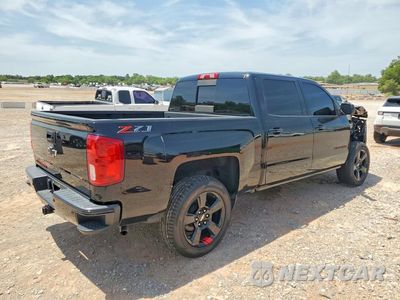 Trzecie zdjęcie samochodu z tyłu: 2018 CHEVROLET SILVERADO K1500 LTZ VIN:3GCUKSECXJG547221 - miniatura
