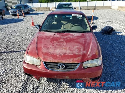 Piąte zdjęcie samochodu w środku: 2001 TOYOTA COROLLA CE VIN:2T1BR12E01C432804 - miniatura