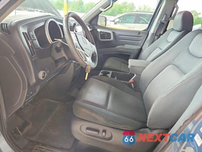 Zdjęcie 7 z 12 samochodu: 2006 HONDA RIDGELINE RTS VIN:2HJYK16456H520756 - miniatura