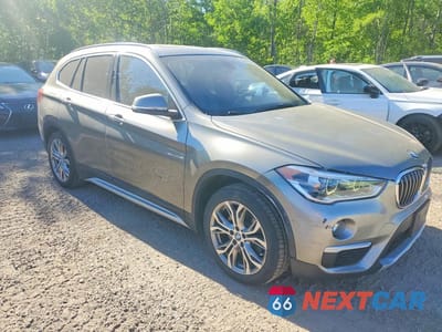 Czwarte zdjęcie samochodu z boku: 2016 BMW X1 XDRIVE28I VIN:WBXHT3C34G5F65551 - miniatura