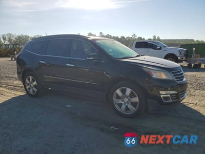 Czwarte zdjęcie samochodu z boku: 2016 CHEVROLET TRAVERSE LTZ VIN:1GNKRJKD9GJ147854 - miniatura