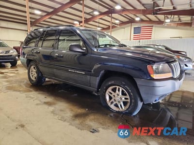 Czwarte zdjęcie samochodu z boku: 2004 JEEP GRAND CHEROKEE LAREDO VIN:1J4GW48S04C109874 - miniatura