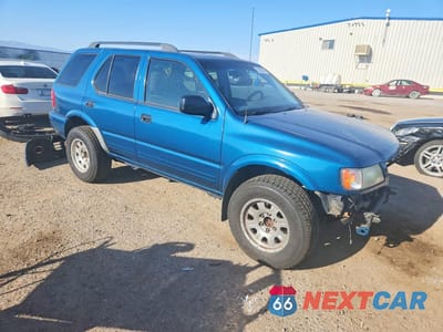 Czwarte zdjęcie samochodu z boku: 2003 ISUZU RODEO S VIN:4S2CK58W834306717 - miniatura