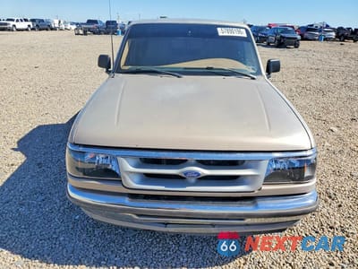 Piąte zdjęcie samochodu w środku: 1995 FORD RANGER VIN:1FTCR10A9SPA33428 - miniatura