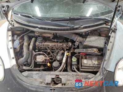 Zdjęcie 11 z 12 samochodu: 2002 VOLKSWAGEN NEW BEETLE GLS TDI VIN:3VWCP21CX2M439989 - miniatura