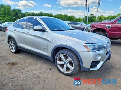 Czwarte zdjęcie samochodu z boku: 2016 BMW X4 XDRIVE35I VIN:5UXXW5C50G0N92123 - miniatura