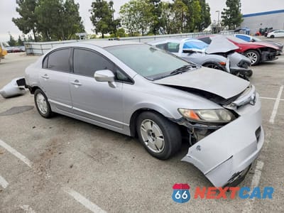 Czwarte zdjęcie samochodu z boku: 2007 HONDA CIVIC HYBRID VIN:JHMFA36237S015851 - miniatura