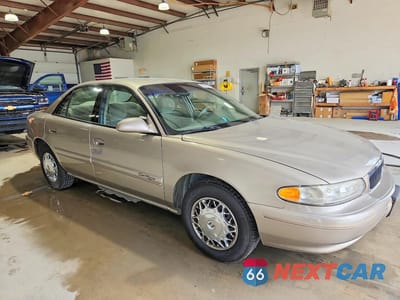Czwarte zdjęcie samochodu z boku: 2002 BUICK CENTURY CUSTOM VIN:2G4WS52JX21199083 - miniatura