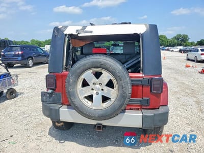 Zdjęcie 6 z 13 samochodu: 2009 JEEP WRANGLER UNLIMITED SAHARA VIN:1J4GA59179L767158 - miniatura