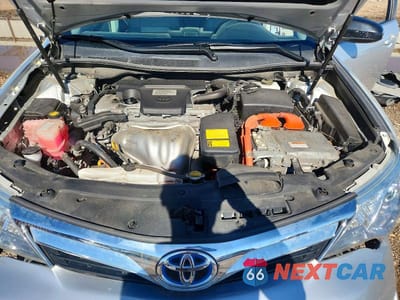 Zdjęcie 11 z 12 samochodu: 2012 TOYOTA CAMRY HYBRID XLE VIN:4T1BD1FK8CU042677 - miniatura