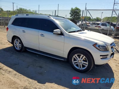 Czwarte zdjęcie samochodu z boku: 2013 MERCEDES-BENZ GL 350 BLUETEC VIN:4JGDF2EE9DA190750 - miniatura