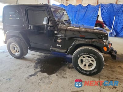 Czwarte zdjęcie samochodu z boku: 1999 JEEP WRANGLER / TJ SAHARA VIN:1J4FY49S1XP401485 - miniatura