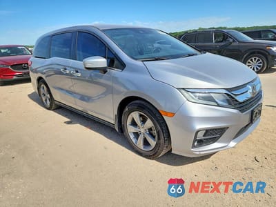 Czwarte zdjęcie samochodu z boku: 2018 HONDA ODYSSEY EXL VIN:5FNRL6H75JB031346 - miniatura