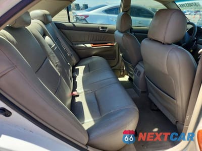 Zdjęcie 10 z 12 samochodu: 2002 TOYOTA CAMRY XLE VIN:4T1BE32KX2U048882 - miniatura