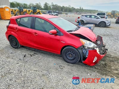 Czwarte zdjęcie samochodu z boku: 2015 TOYOTA PRIUS C ONE VIN:JTDKDTB34F1576036 - miniatura