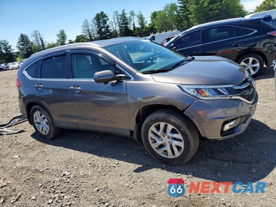 Czwarte zdjęcie samochodu z boku: 2016 HONDA CR-V EXL VIN:2HKRM4H71GH670111 - miniatura