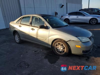 Czwarte zdjęcie samochodu z boku: 2006 FORD FOCUS ZX4 VIN:1FAHP34N66W177377 - miniatura