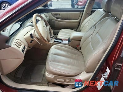 Zdjęcie 7 z 12 samochodu: 2000 TOYOTA AVALON XLS VIN:4T1BF28BXYU093215 - miniatura