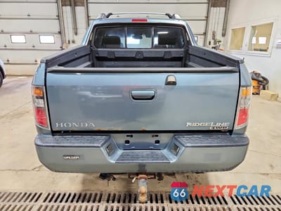 Zdjęcie 6 z 12 samochodu: 2006 HONDA RIDGELINE RTL VIN:2HJYK16536H505228 - miniatura