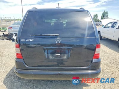 Zdjęcie 6 z 13 samochodu: 2000 MERCEDES-BENZ ML 430 VIN:4JGAB72E2YA159622 - miniatura