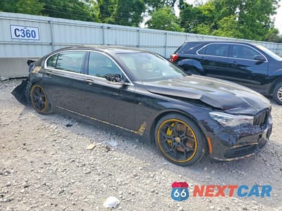 Czwarte zdjęcie samochodu z boku: 2016 BMW 750 XI VIN:WBA7F2C52GG419529 - miniatura