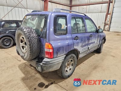 Trzecie zdjęcie samochodu z tyłu: 1999 CHEVROLET TRACKER VIN:2CNBJ13C0X6932410 - miniatura