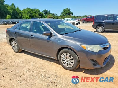 Czwarte zdjęcie samochodu z boku: 2013 TOYOTA CAMRY HYBRID LE VIN:4T1BD1FK0DU066330 - miniatura