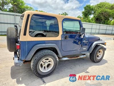 Trzecie zdjęcie samochodu z tyłu: 2000 JEEP WRANGLER / TJ SE VIN:1J4FA29P2YP771267 - miniatura