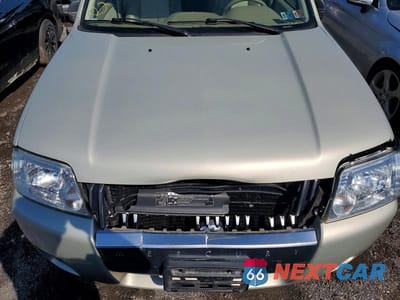 Zdjęcie 12 z 13 samochodu: 2005 MERCURY MARINER VIN:4M2CU57175DJ09238 - miniatura