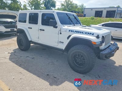 Czwarte zdjęcie samochodu z boku: 2023 JEEP WRANGLER RUBICON 4XE VIN:1C4JJXR62PW513923 - miniatura