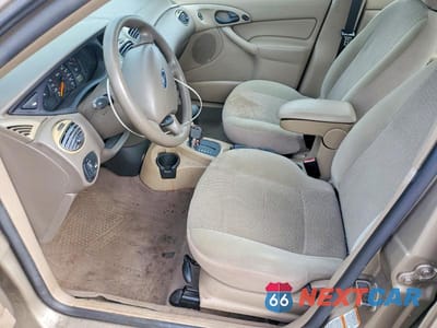 Zdjęcie 7 z 12 samochodu: 2003 FORD FOCUS SE COMFORT VIN:1FAHP34393W206509 - miniatura