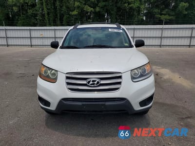Piąte zdjęcie samochodu w środku: 2012 HYUNDAI SANTA FE GLS VIN:5XYZGDAB8CG116975 - miniatura