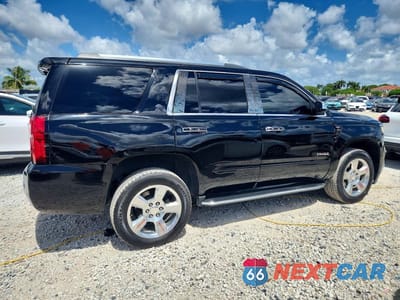 Trzecie zdjęcie samochodu z tyłu: 2017 CHEVROLET TAHOE K1500 PREMIER VIN:1GNSKCKC3HR160190 - miniatura