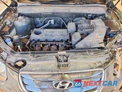 Zdjęcie 12 z 13 samochodu: 2010 HYUNDAI SANTA FE GLS VIN:5NMSG3AB3AH387408 - miniatura