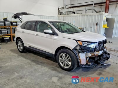 Czwarte zdjęcie samochodu z boku: 2017 FORD EDGE SEL VIN:2FMPK4J80HBC17977 - miniatura