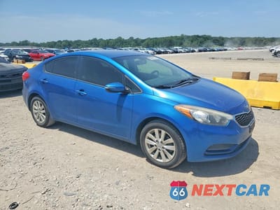 Czwarte zdjęcie samochodu z boku: 2014 KIA FORTE LX VIN:KNAFX4A65E5219866 - miniatura