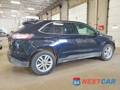 Trzecie zdjęcie samochodu z tyłu: 2018 FORD EDGE VIN:2FMPK3J90JBC40782 - miniatura