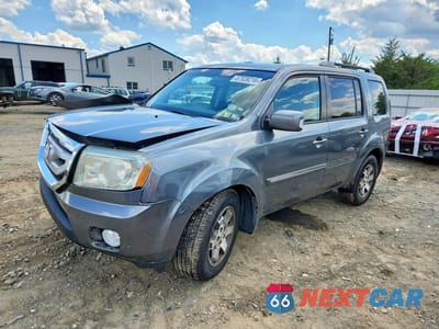 2011 HONDA PILOT TOURING 5FNYF4H92BB100830 - główne zdjęcie licytacji z USA - miniatura