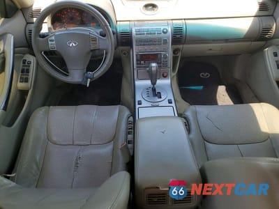 Zdjęcie 8 z 12 samochodu: 2003 INFINITI G35 BASE VIN:JNKCV51E43M311951 - miniatura