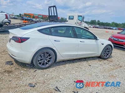 Trzecie zdjęcie samochodu z tyłu: 2022 TESLA MODEL 3 VIN:5YJ3E1EB1NF315154 - miniatura